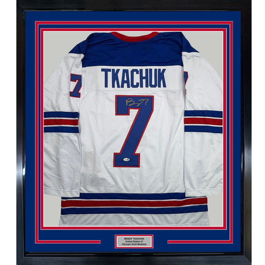 Framed Autographed/Signed Brady Tkachuk 35x39 USA United States 2026 Olympics Gold Medal White Hockey Jersey JSA COA