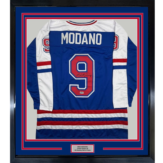 Framed Autographed/Signed Mike Modano 35x39 Team USA Blue Hockey Jersey Beckett BAS COA