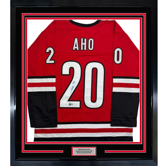 Framed Autographed/Signed Sebastian Aho 35x39 Carolina Red Hockey Jersey Beckett BAS COA