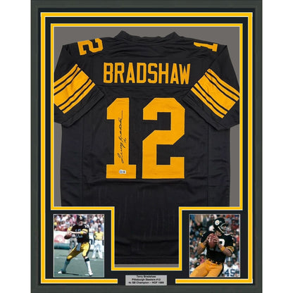 Framed Autographed/Signed Terry Bradshaw 35x39 Pittsburgh Black Color Rush Football Jersey Beckett BAS COA