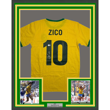 Framed Autographed/Signed Zico 35x39 Brazil Yellow Soccer Futbol Jersey Beckett BAS COA