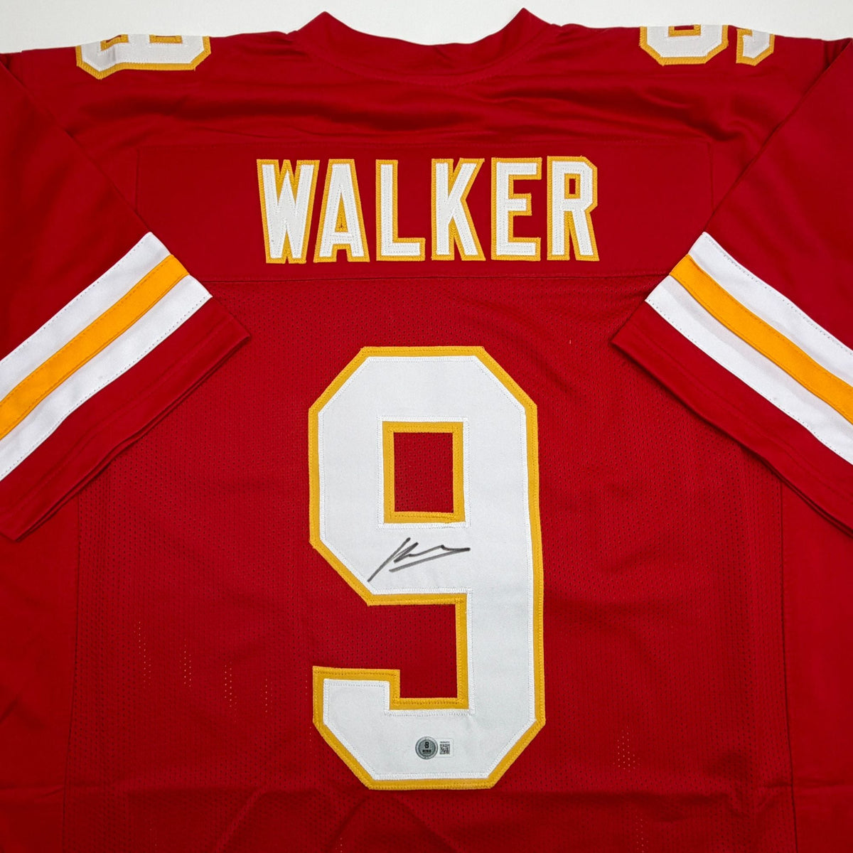 Autographed/Signed Kenneth Walker III Kansas City Red Football Jersey Beckett BAS COA