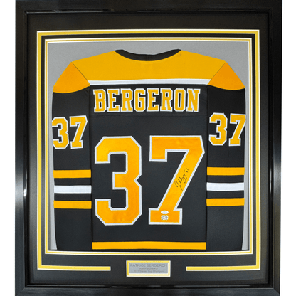 Framed Autographed/Signed Patrice Bergeron 35x39 Boston Black Hockey Jersey JSA COA