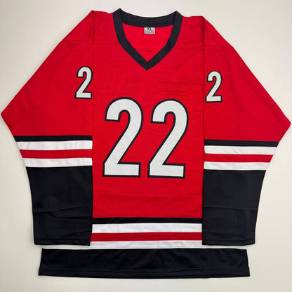 Autographed/Signed Logan Stankoven Carolina Red Hockey Jersey Beckett BAS COA