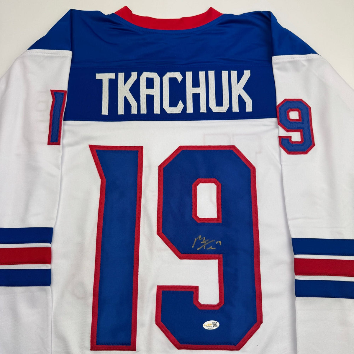 Autographed/Signed Matthew Tkachuk USA United States 2026 Olympics Gold Medal White Hockey Jersey JSA COA