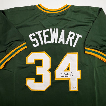 Autographed/Signed Dave Stewart Oakland Green Baseball Jersey JSA COA
