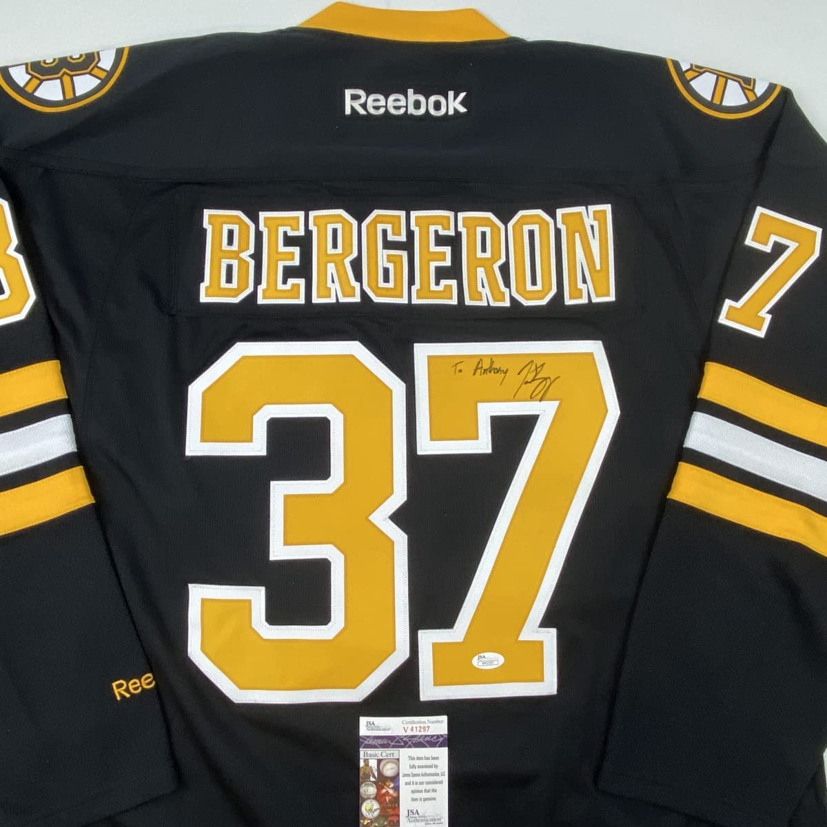 Autographed/Signed Patrice Bergeron Personalized To Anthony Boston Bruins Black Hockey Jersey JSA COA