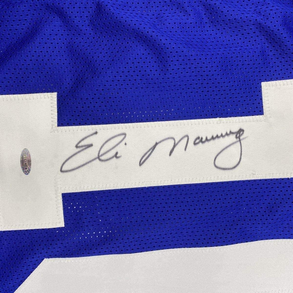 Framed Autographed/Signed Eli Manning 33x42 New York Blue Football Jersey Steiner Sports COA Hologram Only