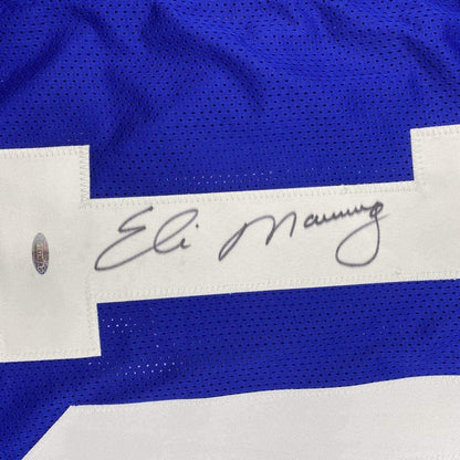 Framed Autographed/Signed Eli Manning 33x42 New York Blue Football Jersey Steiner Sports COA Hologram Only