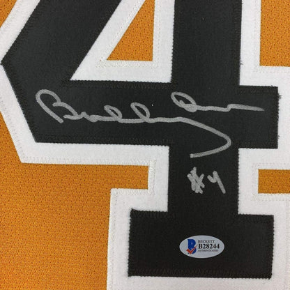 Framed Autographed/Signed Bobby Orr 33x42 Boston Yellow Hockey Jersey Beckett BAS & GNR COA