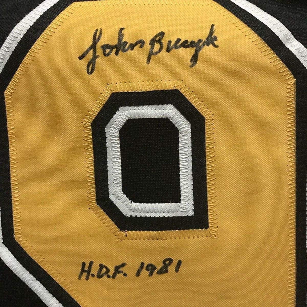 Framed Autographed/Signed John Johnny Bucyk HOF 1981 33x42 Boston Black Hockey Jersey JSA COA