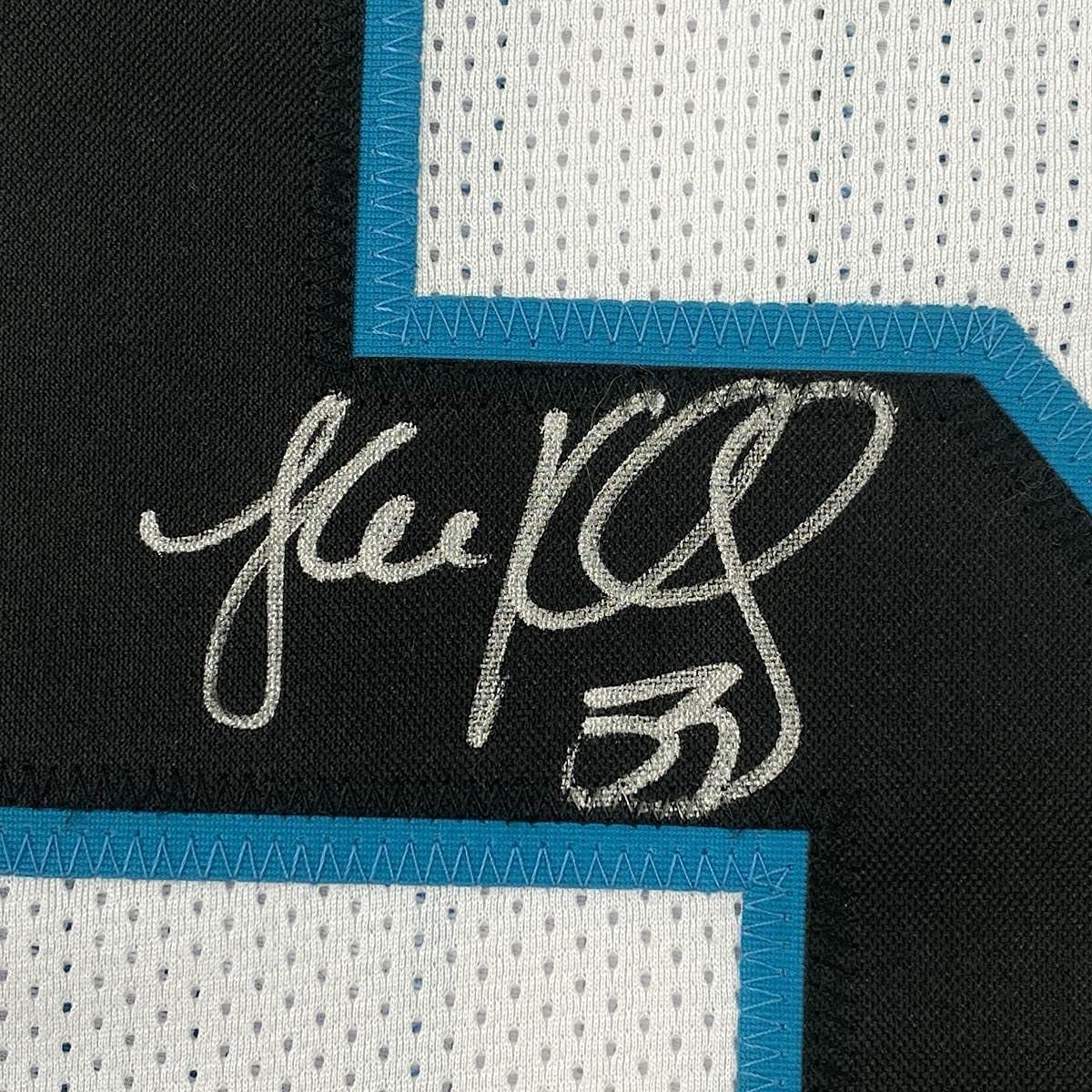 Framed Autographed/Signed Luke Kuechly 33x42 Carolina White Football Jersey Beckett BAS COA