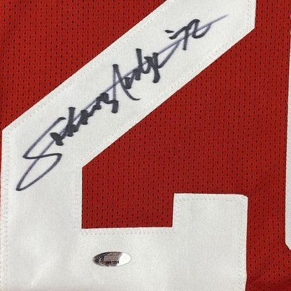 Framed Autographed/Signed Johnny Rodgers 33x42 Nebraska Red College Football Jersey Tristar COA Holo Only
