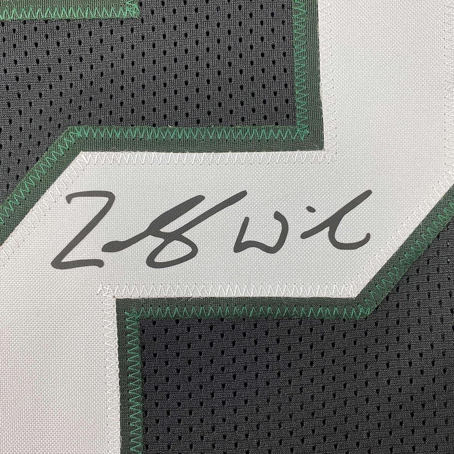 Framed Facsimile Autographed Zach Wilson 35x39 New York Black Reprint Laser Auto Football Jersey