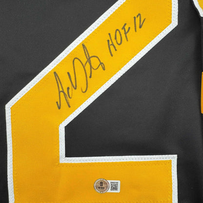 Framed Autographed/Signed Adam Oates 35x39 "HOF 12" Boston Black Hockey Jersey Beckett BAS COA
