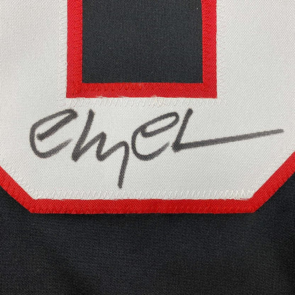 Framed Autographed/Signed Chevy Chase Clark Griswold 35x39 Christmas Vacation Movie Chicago Black Hockey Jersey Beckett BAS COA