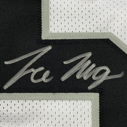 Framed Autographed/Signed Trevon Moehrig 35x39 Las Vegas Oakland White Football Jersey JSA COA