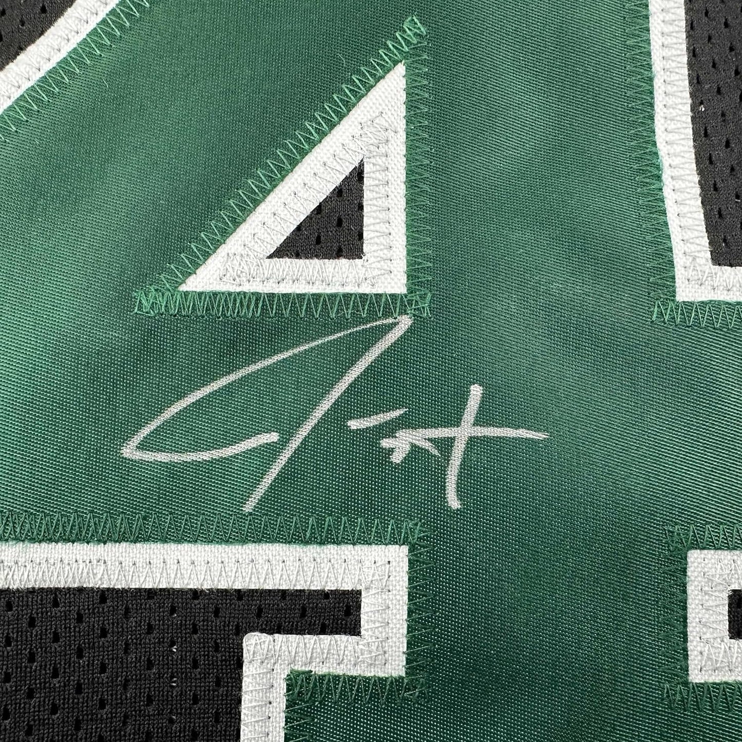 Framed Autographed/Signed Jrue Holiday 35x39 Boston Black Basketball Jersey JSA COA