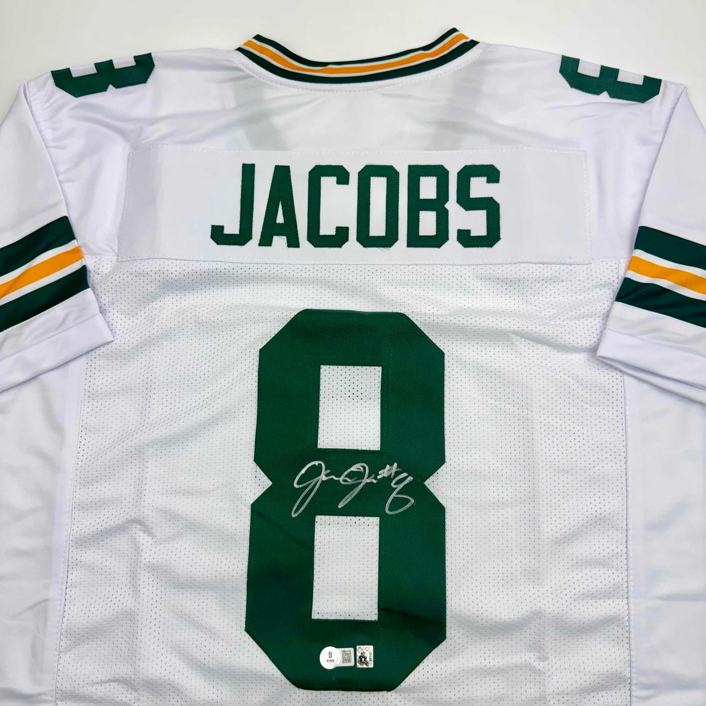 Autographed/Signed Josh Jacobs Green Bay White Football Jersey Beckett BAS COA
