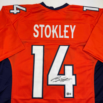 Autographed/Signed Brandon Stokley Denver Orange Football Jersey Beckett BAS COA