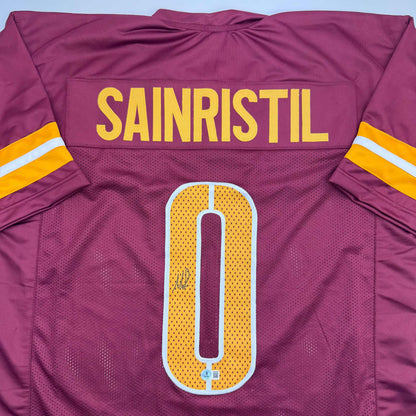 Autographed/Signed Mike Sainristil Washington Burgundy Football Jersey Beckett BAS COA