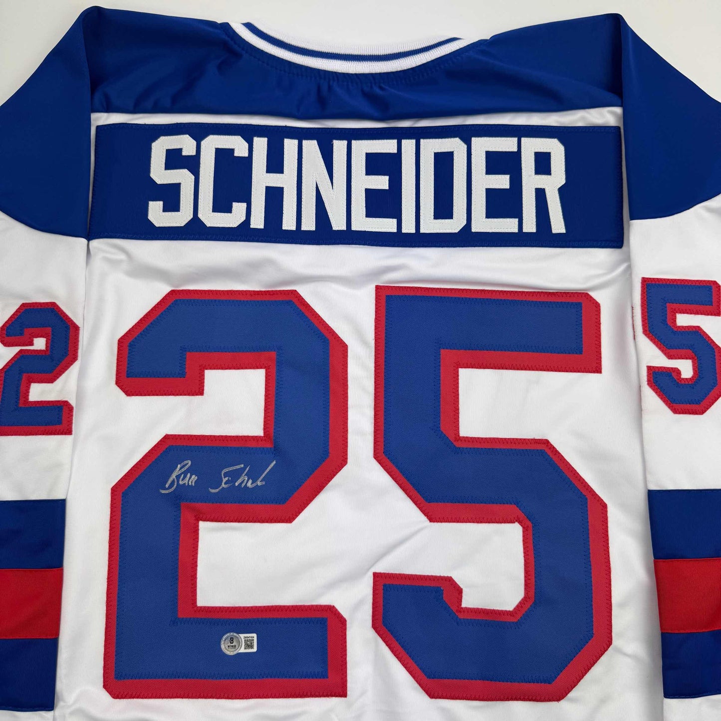 Autographed/Signed Buzz Schneider White Team USA Miracle On Ice 1980 Olympics Hockey Jersey Beckett BAS COA