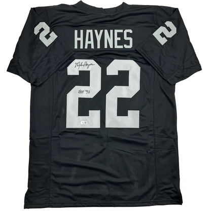 Autographed/Signed Michael Mike Haynes HOF 97 Oakland Black Football Jersey Beckett BAS COA
