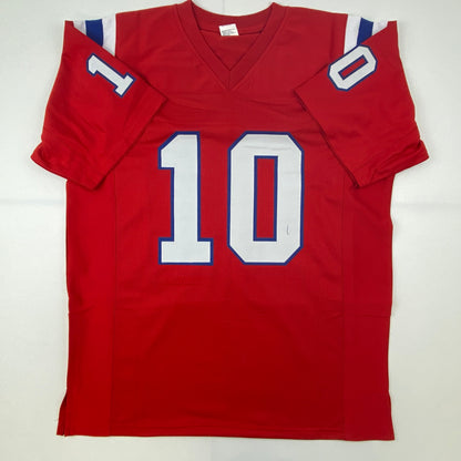 Autographed/Signed Mac Jones New England Red Football Jersey Beckett BAS COA