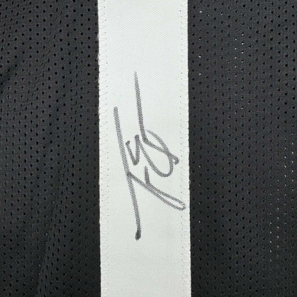 Framed Autographed/Signed Travis Etienne Jr. 35x39 Jacksonville Black Football Jersey Beckett BAS COA