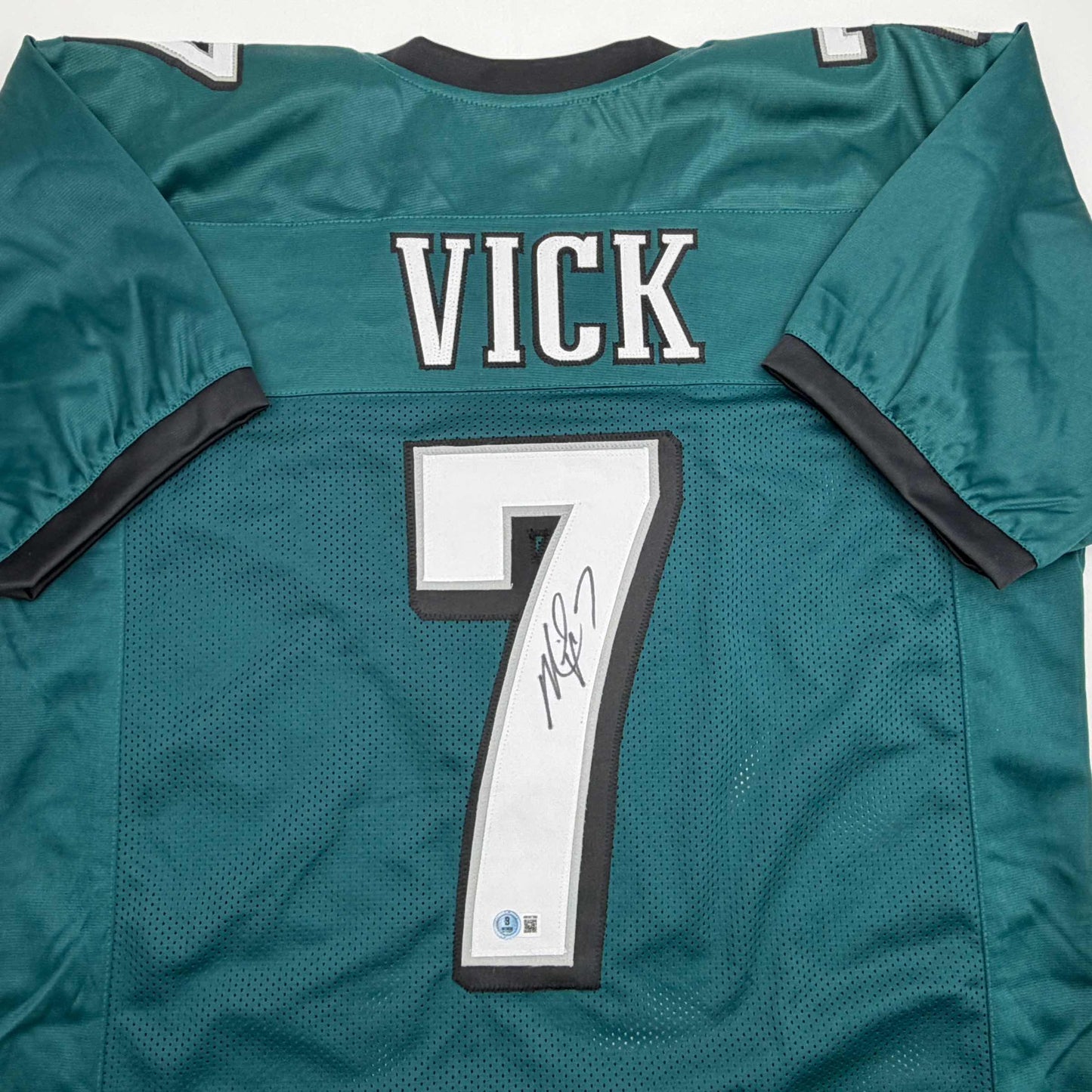 Autographed/Signed Michael Mike Vick Philadelphia Green Football Jersey Beckett BAS COA