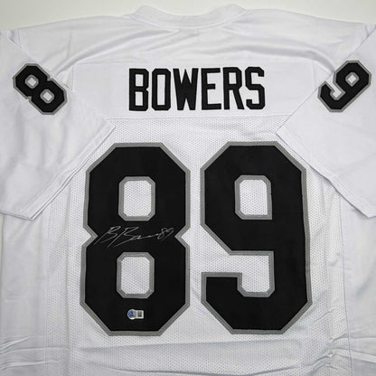 Autographed/Signed Brock Bowers Las Vegas Oakland White Football Jersey Beckett BAS COA