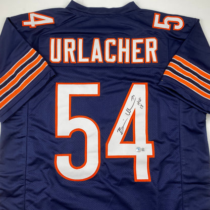 Autographed/Signed Brian Urlacher HOF 18 Chicago Blue Football Jersey Beckett BAS COA