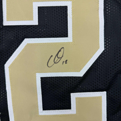 Framed Autographed/Signed Chris Olave 35x39 New Orleans Black Football Jersey Beckett BAS COA