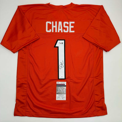Autographed/Signed Ja'Marr Chase Cincinnati Orange Football Jersey JSA COA