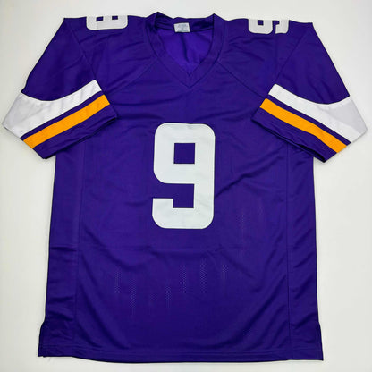 Autographed/Signed J.J. JJ McCarthy Minnesota Purple Football Jersey Beckett BAS COA
