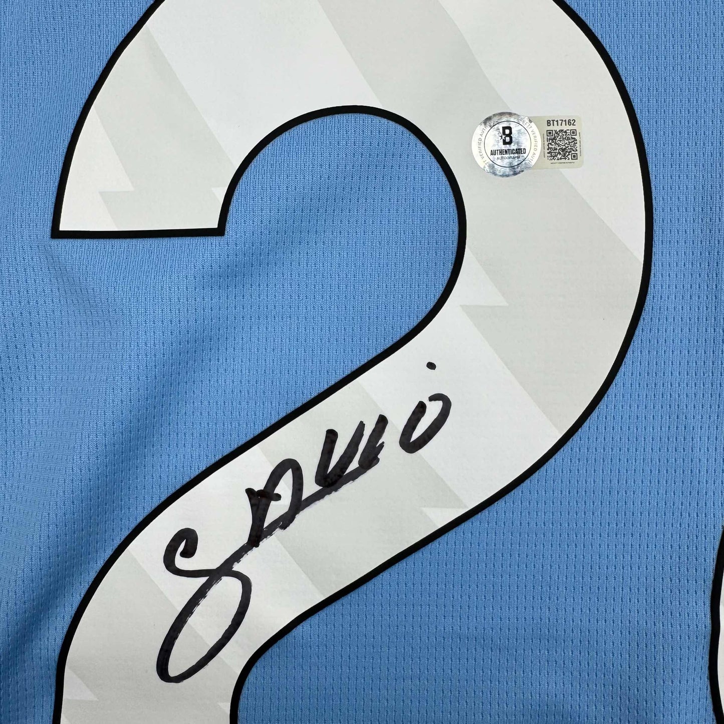 Autographed/Signed Savinho Manchester City Blue Soccer Futbol Jersey Beckett BAS COA