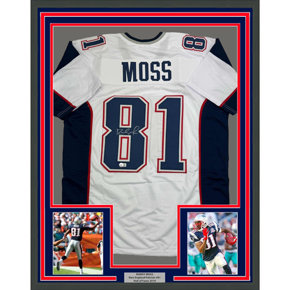 Framed Autographed/Signed Randy Moss 35x39 New England White Football Jersey Beckett BAS COA
