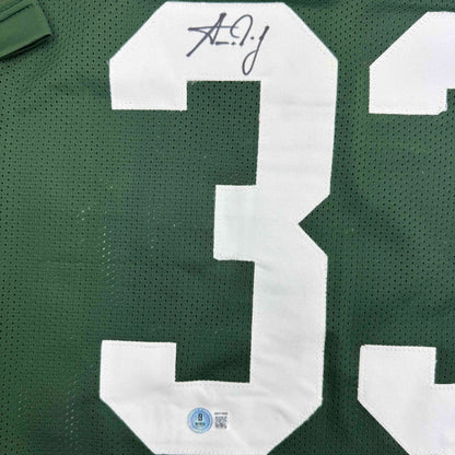 Autographed/Signed Aaron Jones Green Bay Green Football Jersey Beckett BAS COA