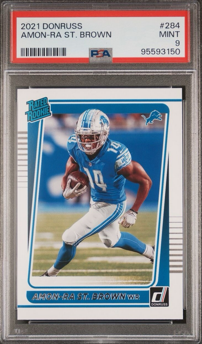 Graded 2021 Panini Donruss Amon-Ra St. Brown #284 Rookie RC Football Card PSA 9 Mint