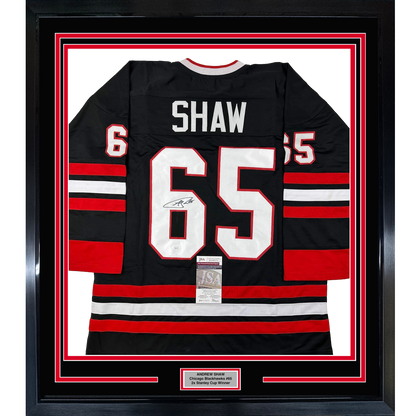 Framed Autographed/Signed Andrew Shaw 35x39 Chicago Black Hockey Jersey JSA COA