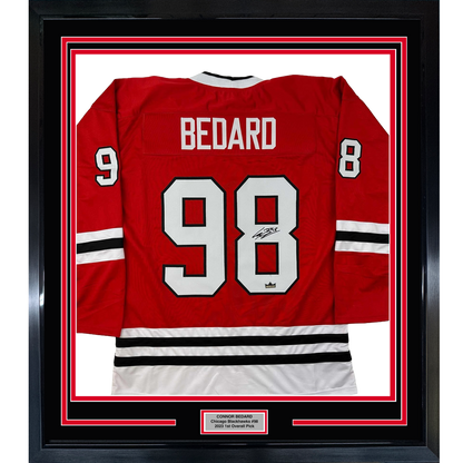 Framed Facsimile Autographed Connor Bedard 35x39 Chicago Red Reprint Laser Auto Hockey Jersey