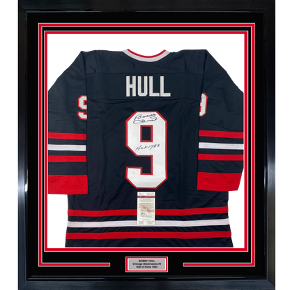 Framed Autographed/Signed Bobby Hull HOF 1983 35x39 Chicago Black Hockey Jersey JSA COA