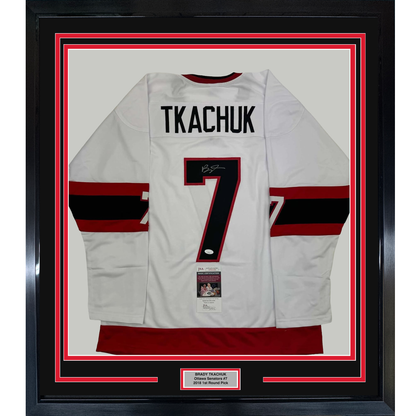 Framed Autographed/Signed Brady Tkachuk 35x39 Ottawa White Hockey Jersey JSA COA