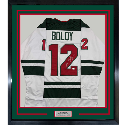 Framed Autographed/Signed Matt Boldy 35x39 Minnesota White Hockey Jersey Beckett BAS COA