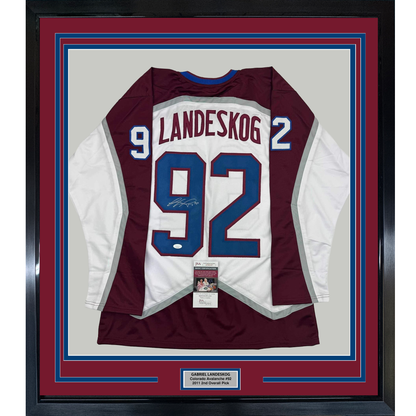 Framed Autographed/Signed Gabriel Landeskog 35x39 White Colorado Hockey Jersey JSA COA