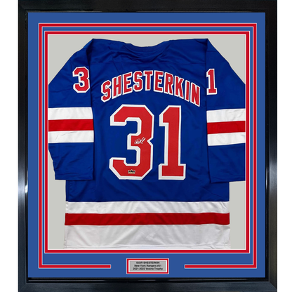 Framed Facsimile Autographed Igor Shesterkin 35x39 New York Blue Reprint Laser Auto Hockey Jersey
