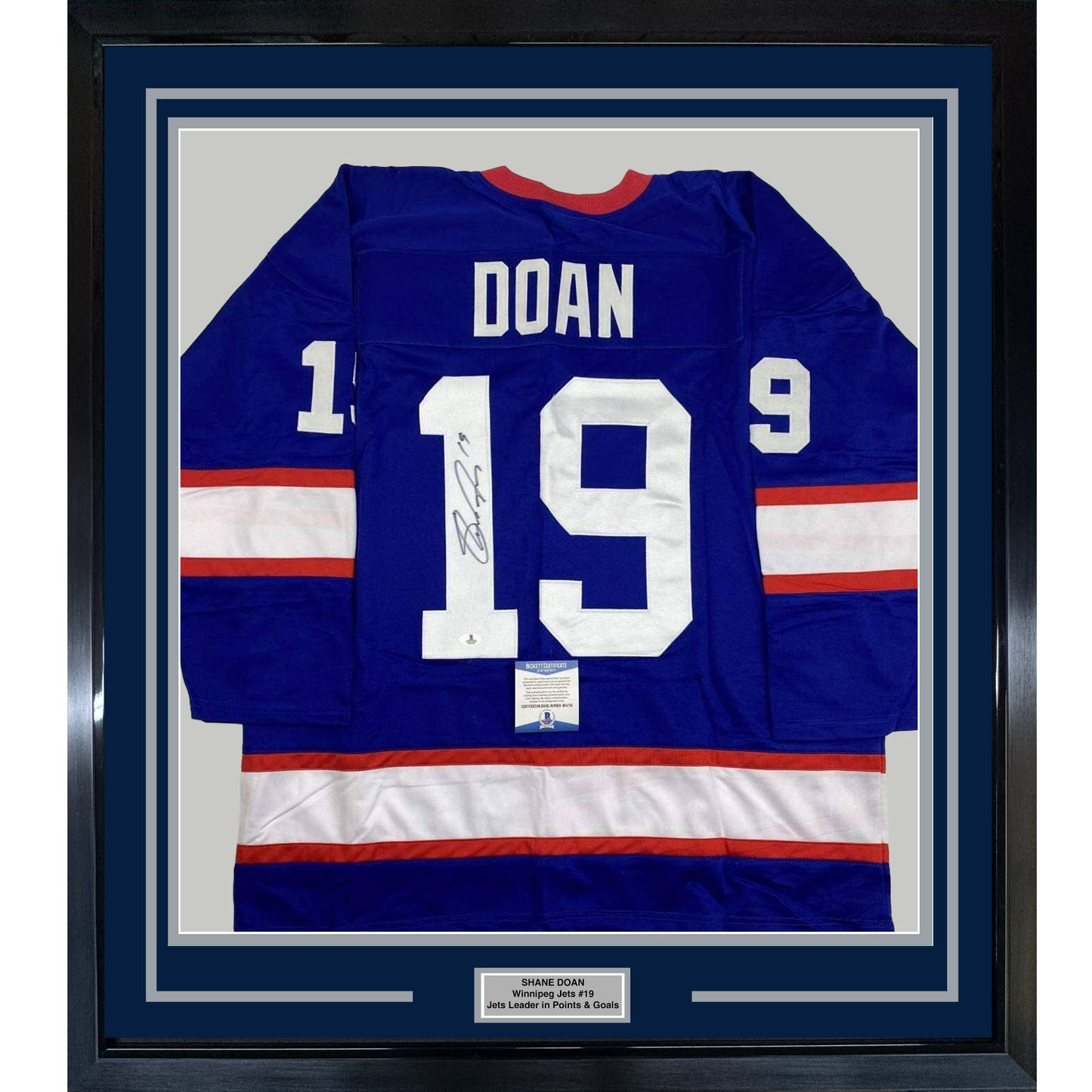 Framed Autographed/Signed Shane Doan 35x39 Winnipeg Blue Hockey Jersey Beckett BAS COA