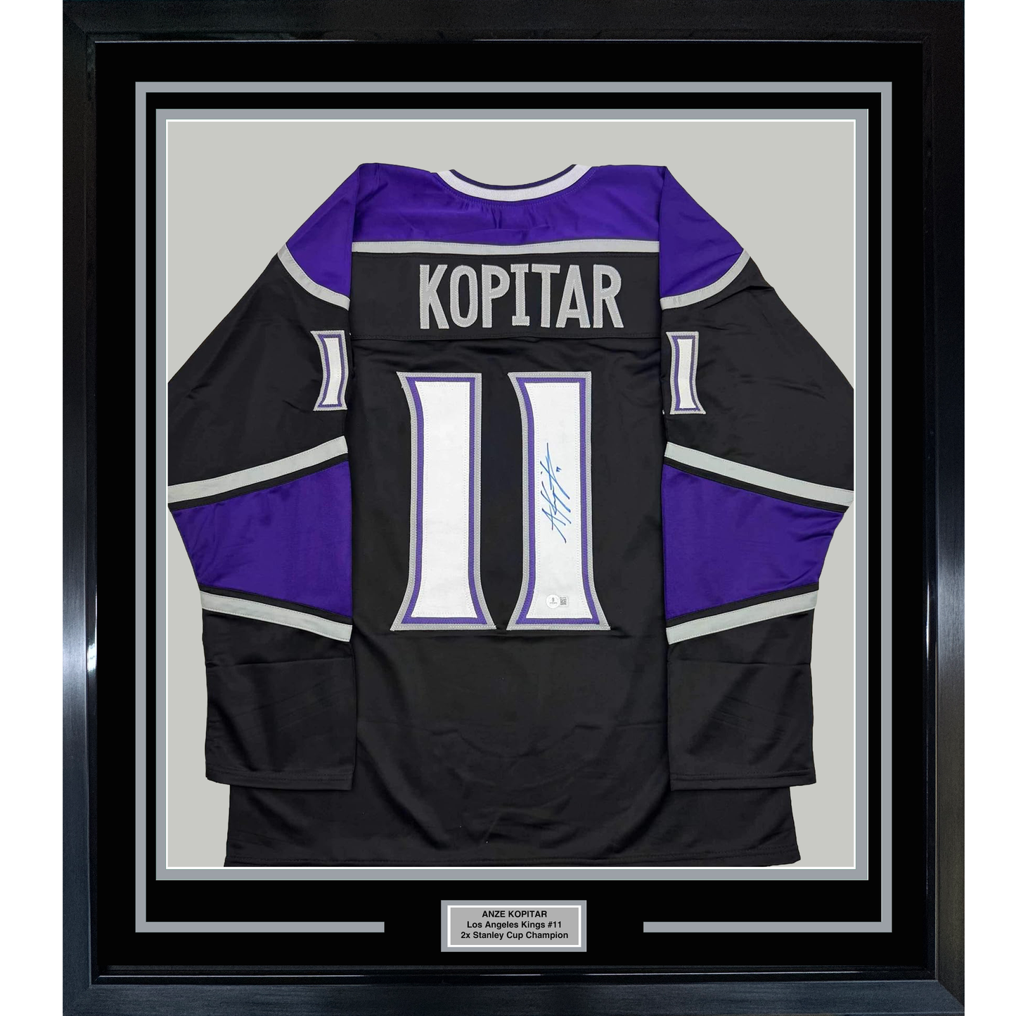 Framed Autographed/Signed Anze Kopitar 35x39 Los Angeles LA Black Hockey Jersey Beckett BAS COA #2