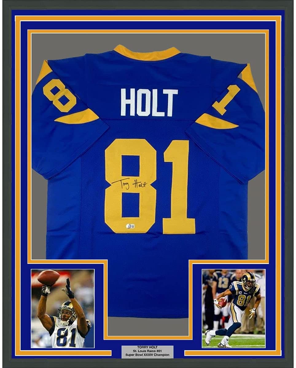 Framed Autographed/Signed Torry Holt 35x39 St. Louis Retro Blue Football Jersey Beckett BAS COA