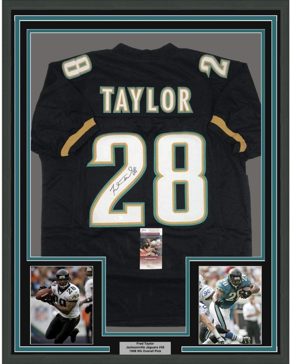 Framed Autographed/Signed Fred Taylor 35x39 Jacksonville Black Football Jersey JSA COA